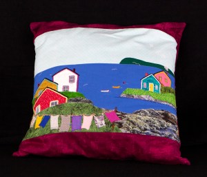 houses in a fishing bay with clothes line in forefront