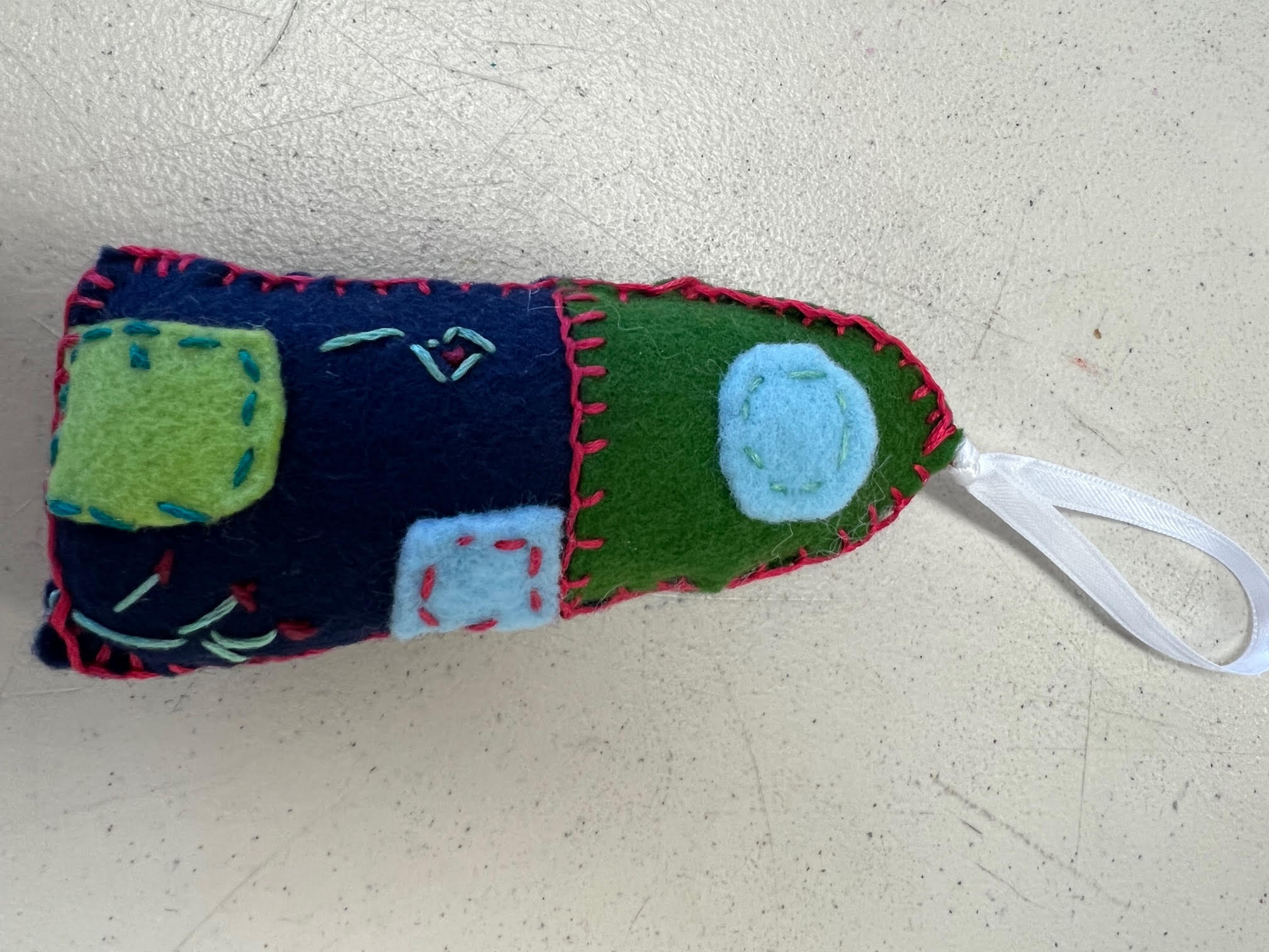 Frances' embroidered house